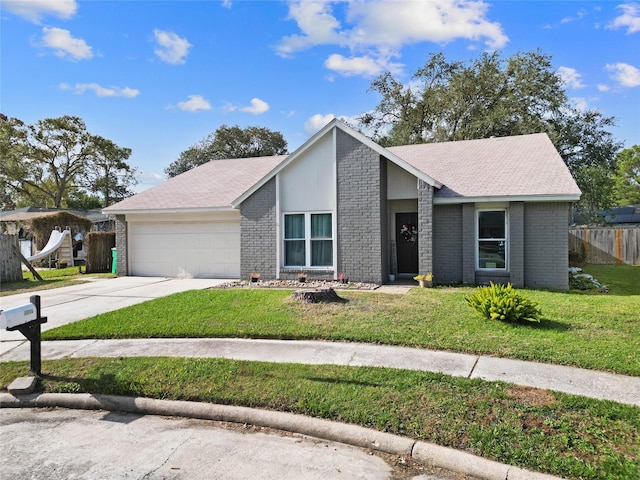 single story home with a front lawn and a garage