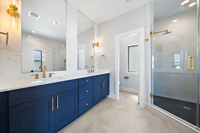 bathroom featuring vanity, a shower with shower door, and toilet