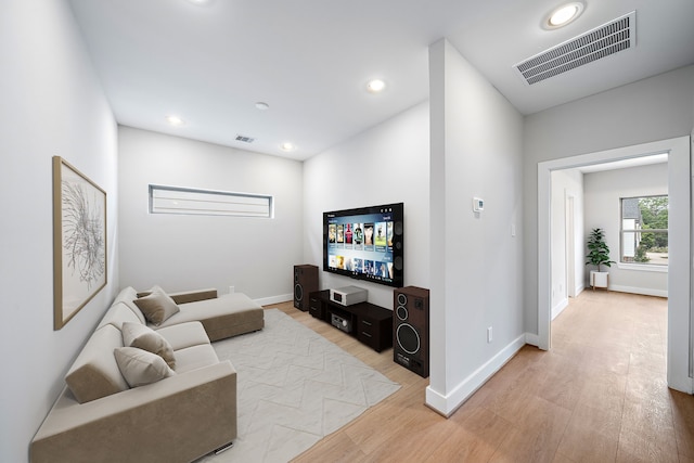 living room with light hardwood / wood-style floors