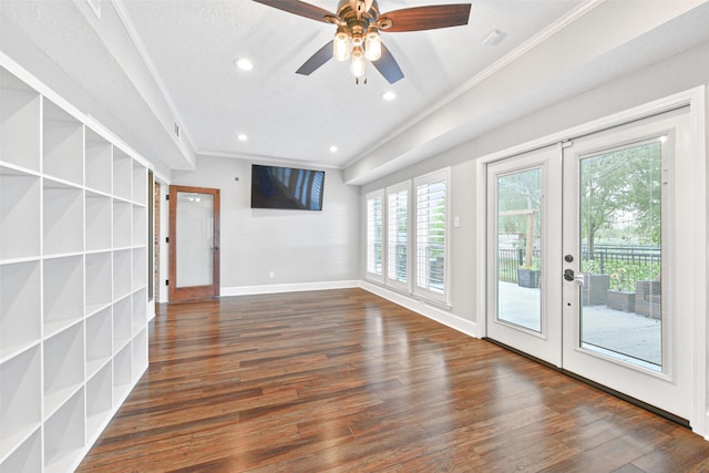 unfurnished living room with french doors, crown molding, ceiling fan, a textured ceiling, and dark hardwood / wood-style flooring