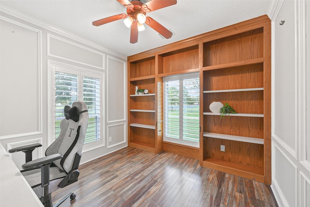 home office with ceiling fan, a healthy amount of sunlight, built in features, and dark wood-type flooring