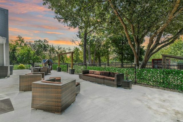 patio terrace at dusk with an outdoor hangout area