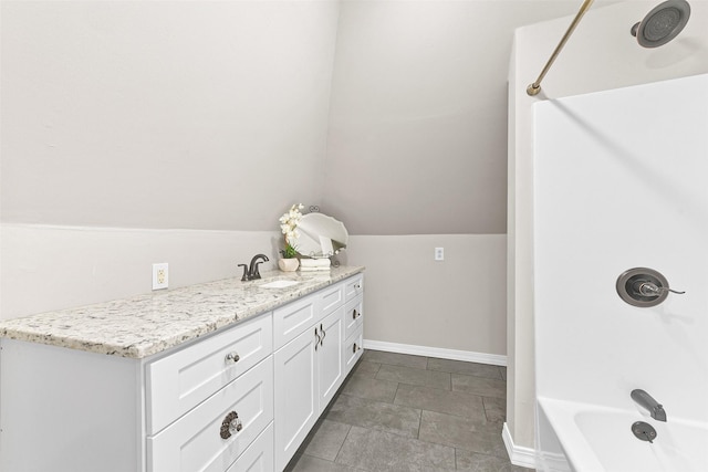 bathroom featuring vanity and bathtub / shower combination