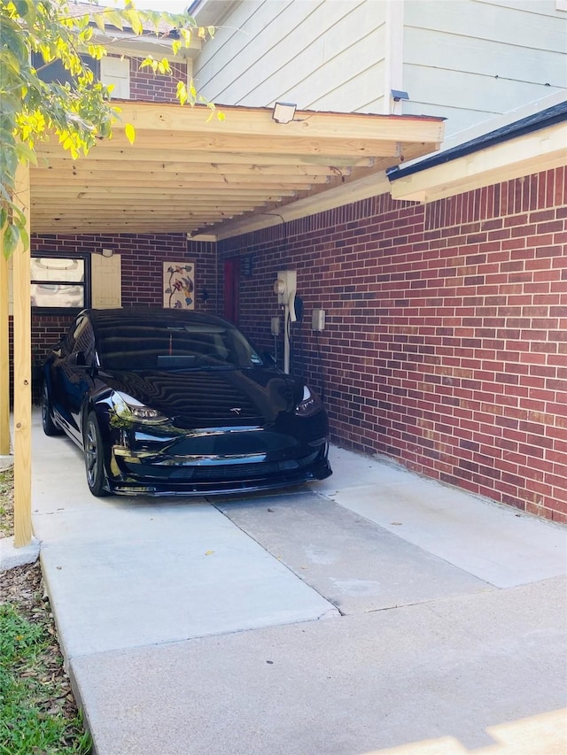 garage featuring a carport