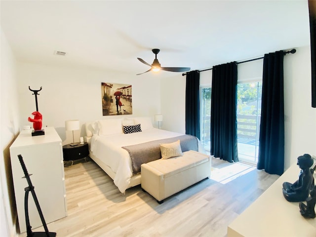 bedroom with access to exterior, ceiling fan, and light hardwood / wood-style floors