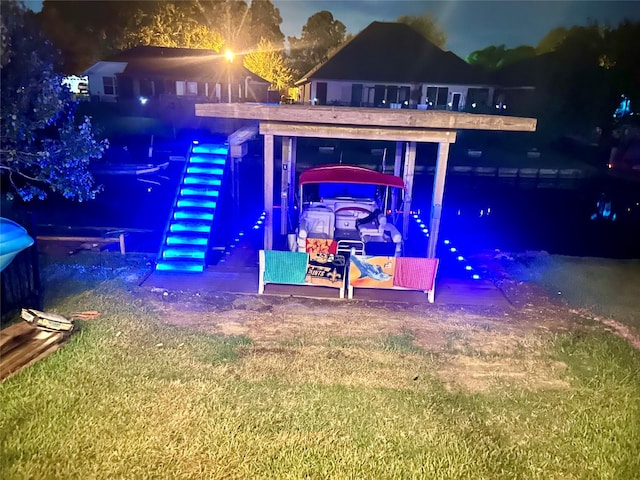 view of yard featuring a boat dock