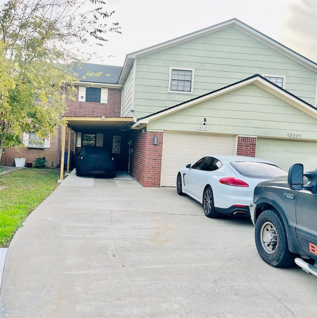 front facade featuring a garage and a carport