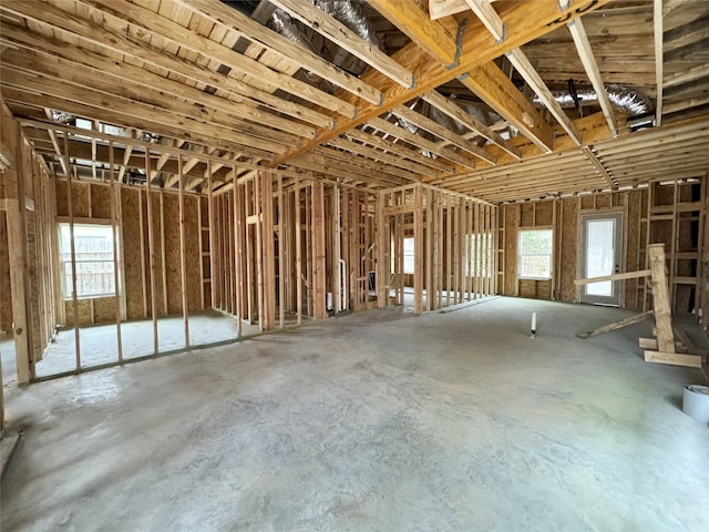 misc room featuring concrete floors and a healthy amount of sunlight