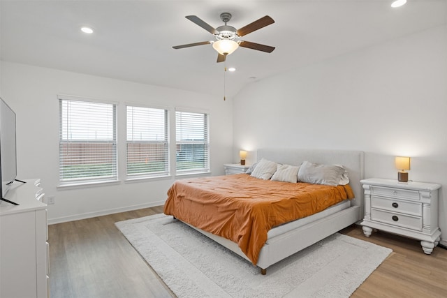 bedroom featuring light wood-type flooring and ceiling fan