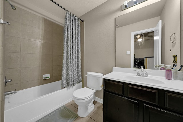 full bathroom featuring shower / tub combo, vanity, ceiling fan, tile patterned flooring, and toilet