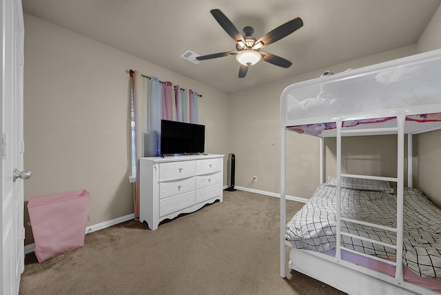 unfurnished bedroom featuring ceiling fan and light carpet