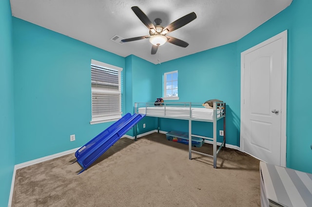 bedroom featuring carpet and ceiling fan