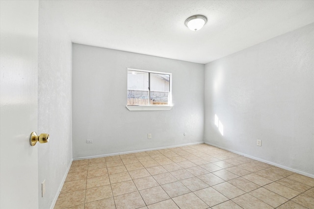 view of tiled empty room