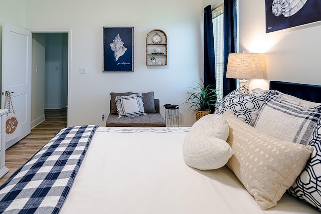 bedroom featuring hardwood / wood-style floors