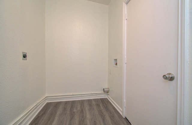 clothes washing area featuring hookup for a washing machine, dark hardwood / wood-style flooring, and hookup for an electric dryer