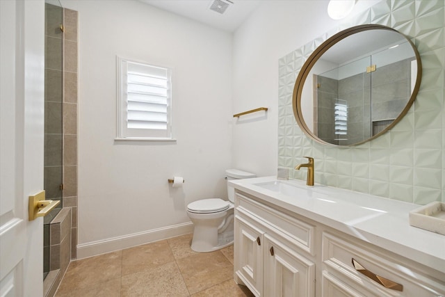 bathroom with vanity, toilet, and walk in shower