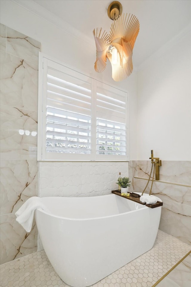 bathroom with tile walls and a tub to relax in