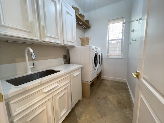 1406 Sue Barnett Dr, Houston, TX 77018 - laundry area with cabinet space, washing machine and clothes dryer, and baseboards