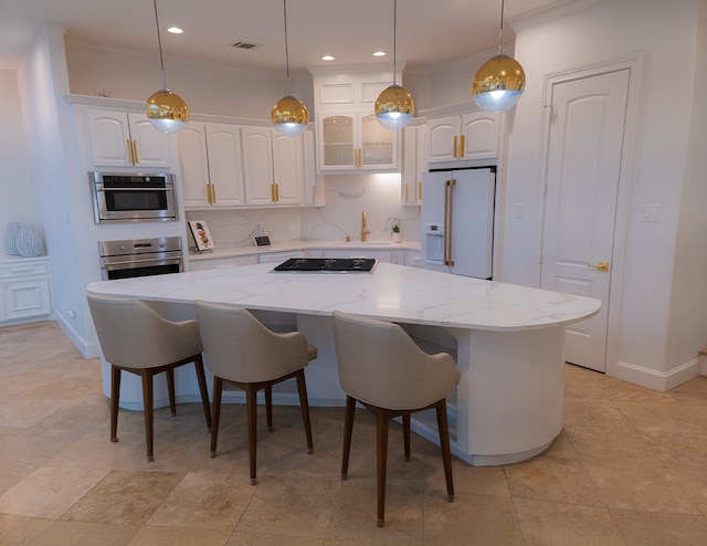 1406 Sue Barnett Dr, Houston, TX 77018 - kitchen with appliances with stainless steel finishes, white cabinetry, a center island, ornamental molding, and hanging light fixtures