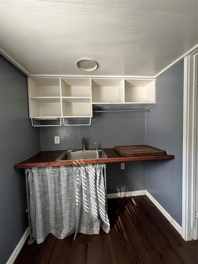 kitchen with sink and wood-type flooring