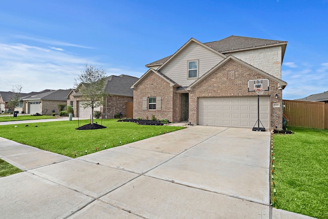 view of property featuring a wall mounted AC, a front yard, and a garage