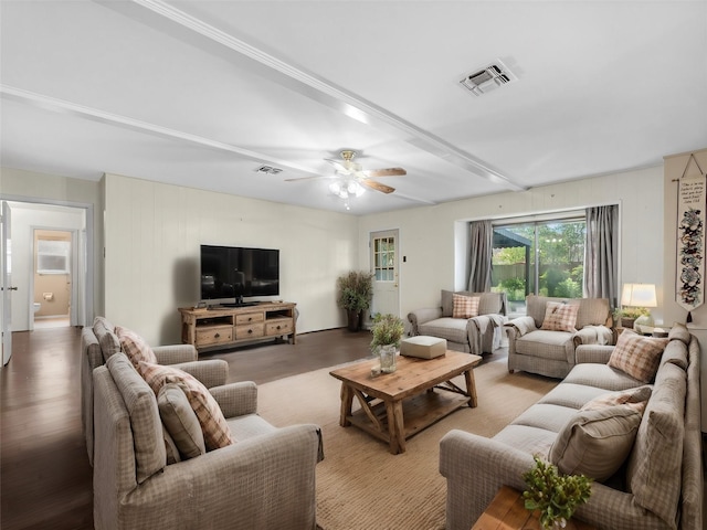 living room with ceiling fan and wood-type flooring