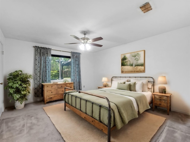 bedroom with ceiling fan and carpet floors