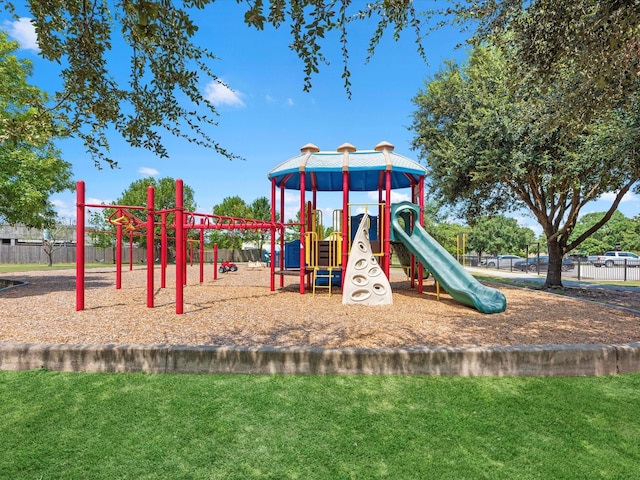 view of play area featuring a lawn