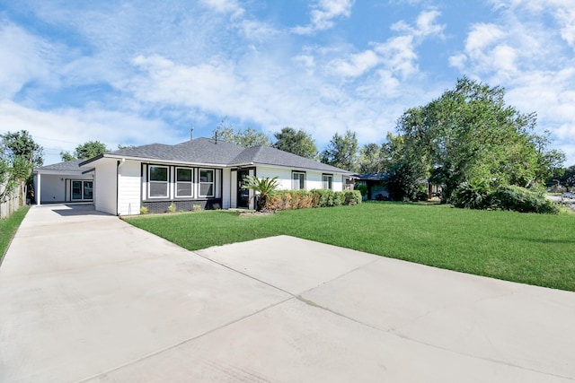 ranch-style house with a front yard