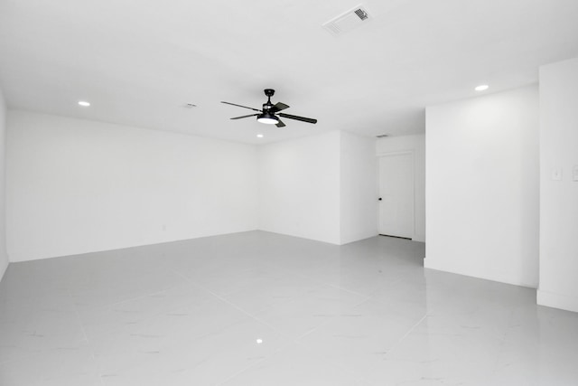 empty room featuring ceiling fan