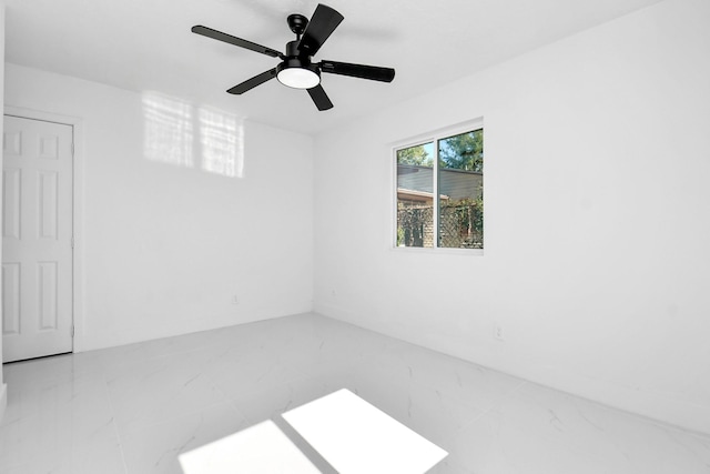 unfurnished room featuring ceiling fan