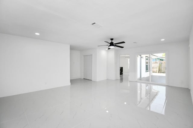 unfurnished room featuring ceiling fan