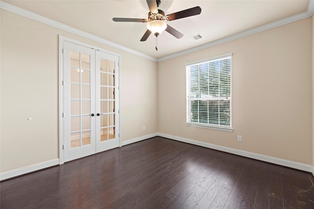 empty room featuring french doors, ornamental molding, dark wood-type flooring, and ceiling fan