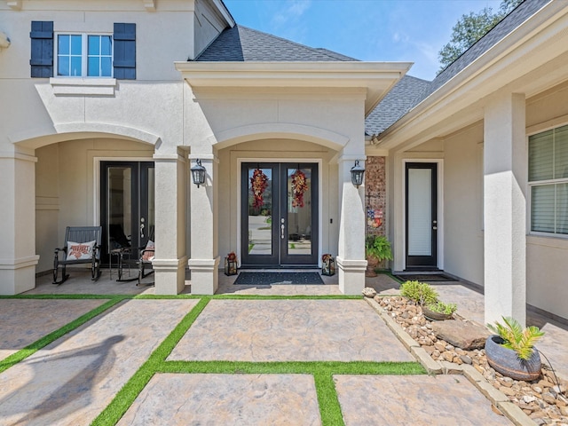 doorway to property featuring french doors