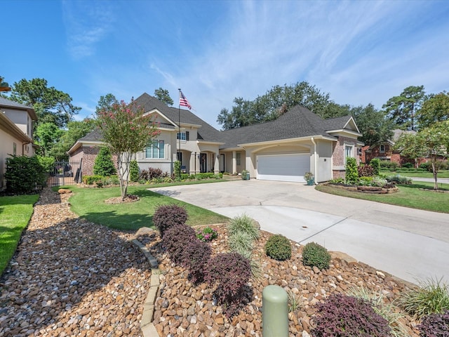 view of front of home featuring a garage and a front lawn