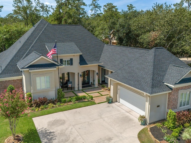 view of front of property featuring a garage