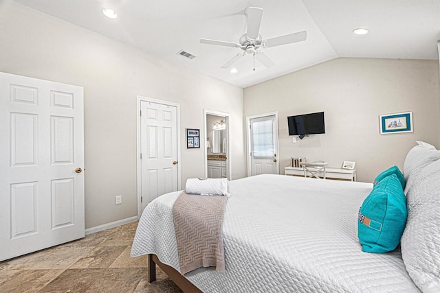 bedroom featuring ensuite bathroom, ceiling fan, and lofted ceiling