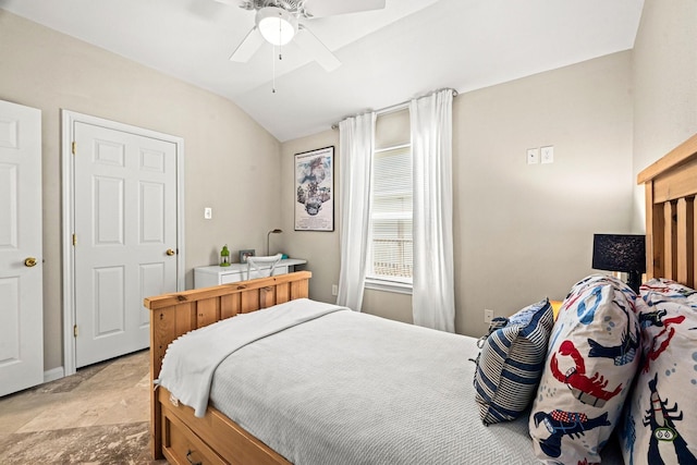 bedroom featuring ceiling fan and vaulted ceiling