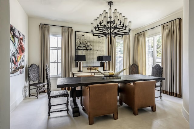 dining space featuring a notable chandelier