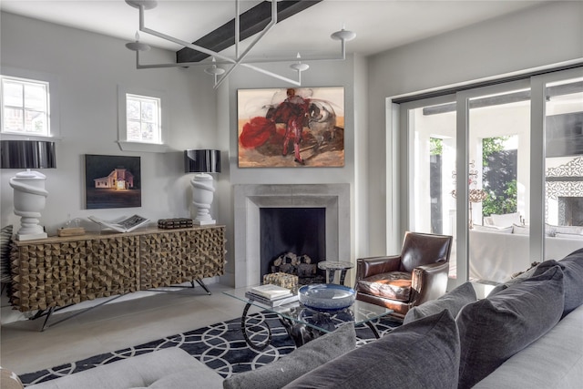 living room with plenty of natural light and concrete floors