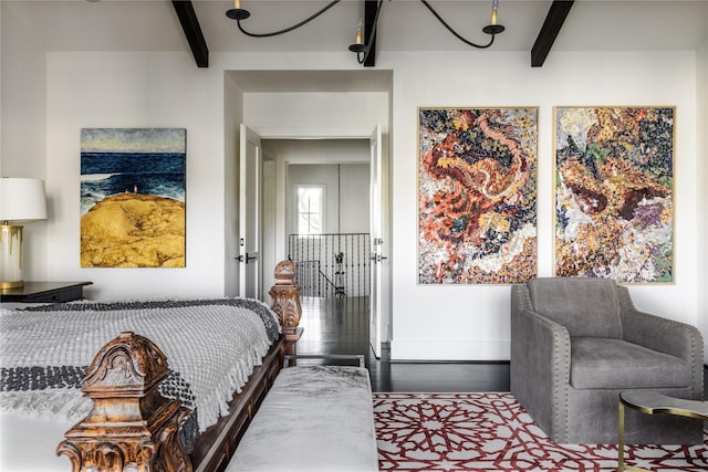 bedroom featuring beamed ceiling