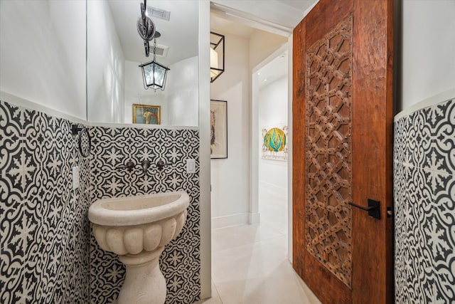 bathroom with tile patterned flooring