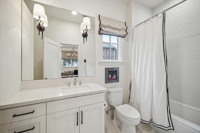 full bathroom with shower / bathtub combination with curtain, vanity, a chandelier, and toilet