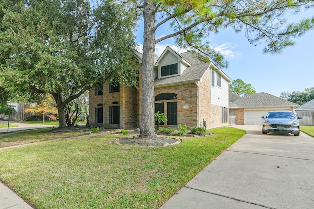 view of front facade with a front yard and a garage