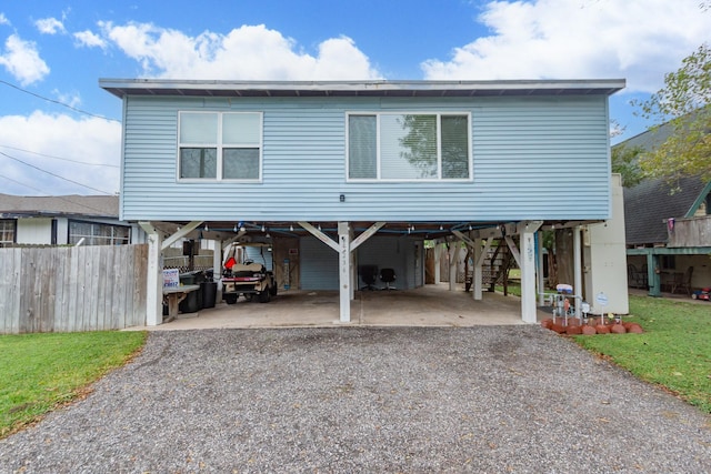 beach home featuring a carport