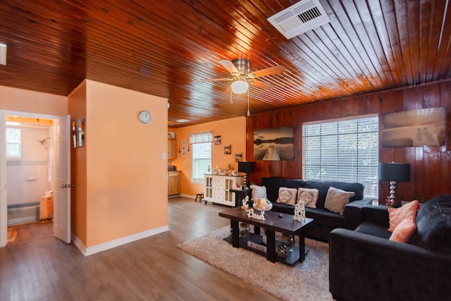 living room with wood ceiling, ceiling fan, hardwood / wood-style floors, and a healthy amount of sunlight