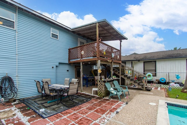 back of property with a patio area