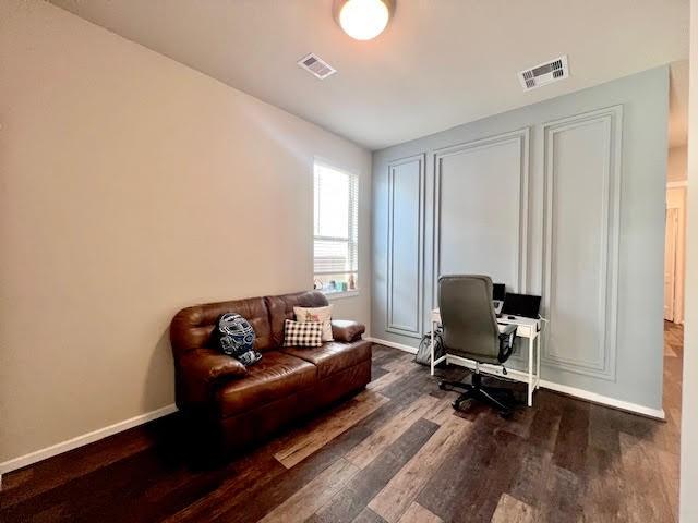 home office featuring dark wood-type flooring