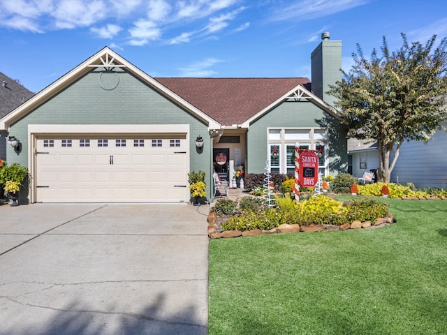 craftsman-style home with a front yard and a garage