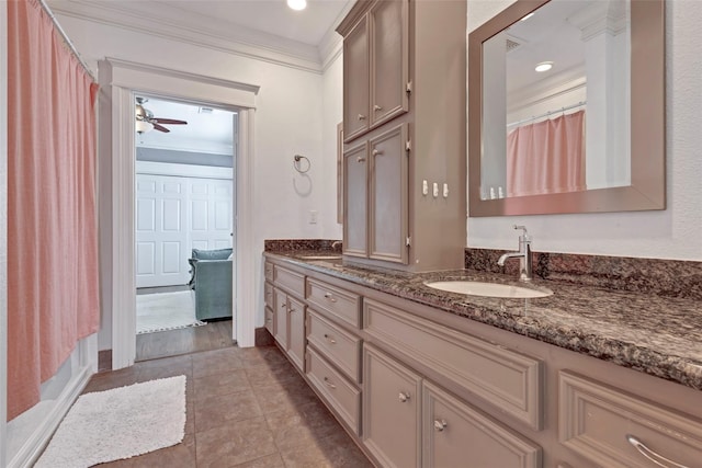 bathroom featuring wood-type flooring, vanity, ceiling fan, and ornamental molding